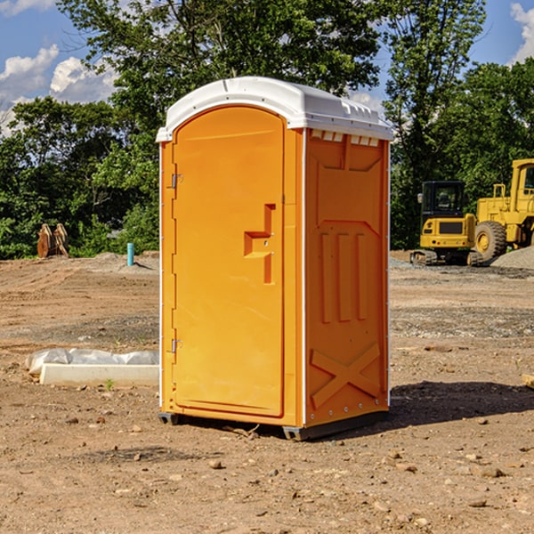 how often are the portable restrooms cleaned and serviced during a rental period in Woodburn Iowa